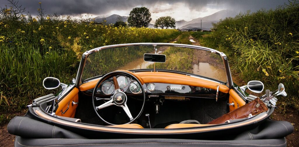 automobile, vehicle, drive, nature, convertible, porsche, lane, rain, thunderstorm, water puddle, sports, landscape, steering wheel, antique car, vacations, leisure time, sports car